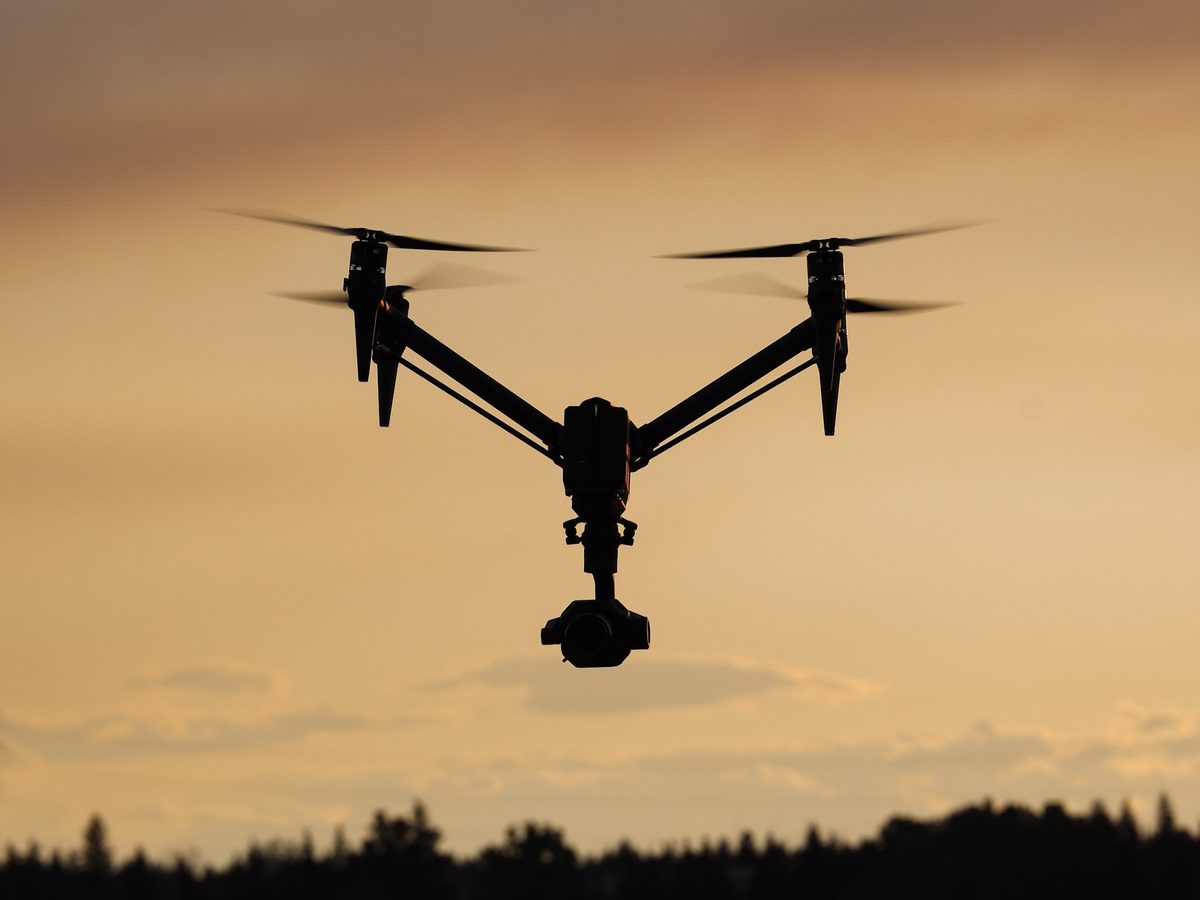 DJI Inspire cinema drone in flight at sunset
